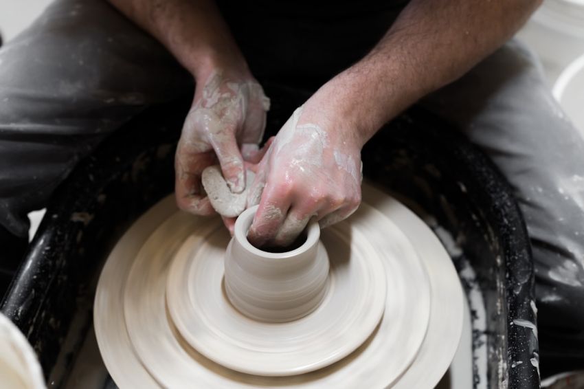 Ceramics - person in white shirt and blue denim jeans