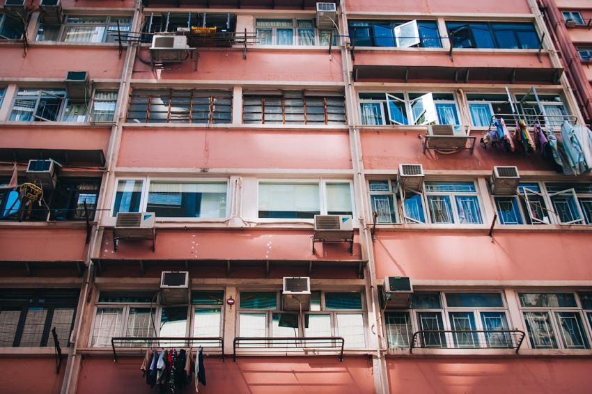 Small Living Spaces - low-angle photography of red building