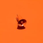 Color Trends - orange megaphone on orange wall