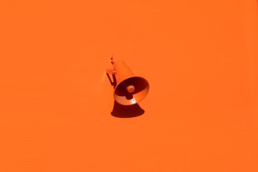 Color Trends - orange megaphone on orange wall