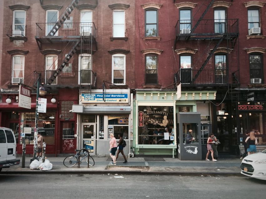 International Stores - people walking on sidewalk